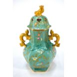 An English early 19th century Chinoiserie hexagonal pottery pot pourri vase moulded with bird and