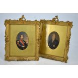 Two early 19th century hand-coloured miniature portrait engravings of gentlemen in gilt frames