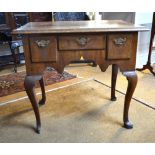 An 18th/19th century walnut lowboy,