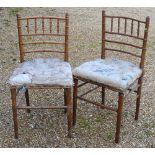 A pair of Victorian faux bamboo side chairs with buttoned fabric seats (2) Condition
