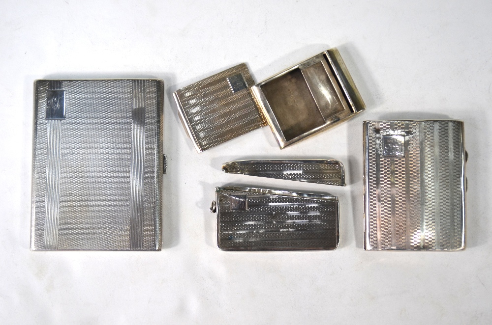 Two engine-turned cigarette cases, Birmingham 1929/35,