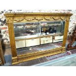 A 19th century giltwood and composite frame with ribbon swag decoration,