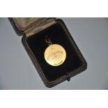 Of golfing interest - 9ct yellow gold circular medal with serrated edges engraved Wimbledon Lady's