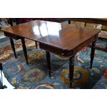 A compact George IV mahogany dining table,