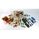A quantity of Dinky vehicles and other models, in played-with condition, including: MG Midget,