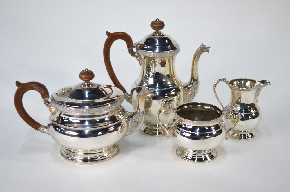 A heavy quality silver four-piece tea/coffee service with Celtic strapwork designs,