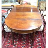 A George III mahogany double D-end dining table,