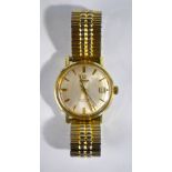 A gentleman's gilt metal Omega Automatic Seamaster De Ville, silvered dial with gilt batons,