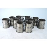 Military interest - A set of ten Liberty & Co Tudric Pewter pint mugs inscribed '2nd Bucks