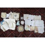 Two boxes of assorted table linen to include large drawn-thread work linen tablecloth,