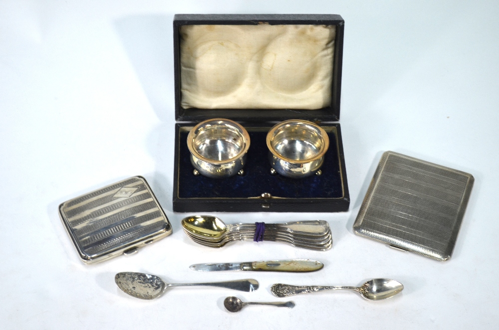 Two engine-turned silver cigarette cases, Birmingham 1925/31,