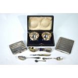 Two engine-turned silver cigarette cases, Birmingham 1925/31,