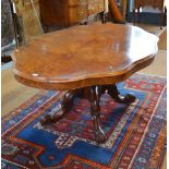 A Victorian walnut centre table, the sha