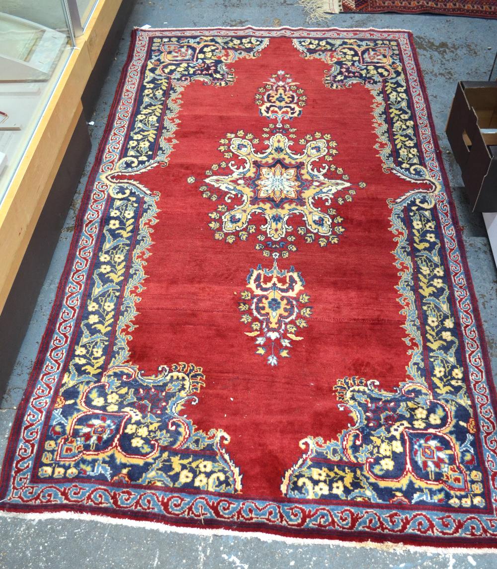 An Old Persian Ardekan rug, red ground,