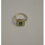 An emerald and diamond set rectangular c