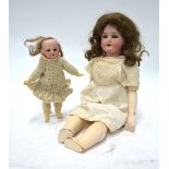 A Simon Halbig 1909/6 bisque-headed girl doll with brown wig, closing blue eyes with eyelashes,