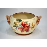 Gien faience large jardiniere, stylised dolphin handles, decorated with flowers and foliage,