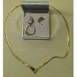 A 9ct gold contemporary suite of sapphire and diamond set jewellery comprising necklace with
