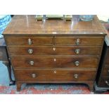 A George III satinwood line inlaid mahogany chest of two short over three long graduated drawers,