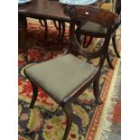 A set of seven Regency mahogany side chairs with moulded and shaped bar backs,