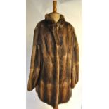 A shadowed musquash fur coat,