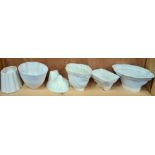 Six 19th/20th century white pottery jelly moulds,
