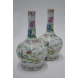 A pair of Chinese famille rose vases;