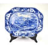 An early 19th century blue and white pearlware meat plate decorated with 'The Gamekeeper' pattern