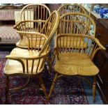 A set of four Batheaston oak Windsor elbow chairs with hoop backs over crinoline stretchers,