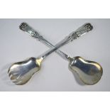 A pair of Danish, 826 grade salad servers with owl finials, FC Christensen, Copenhagen 1909,