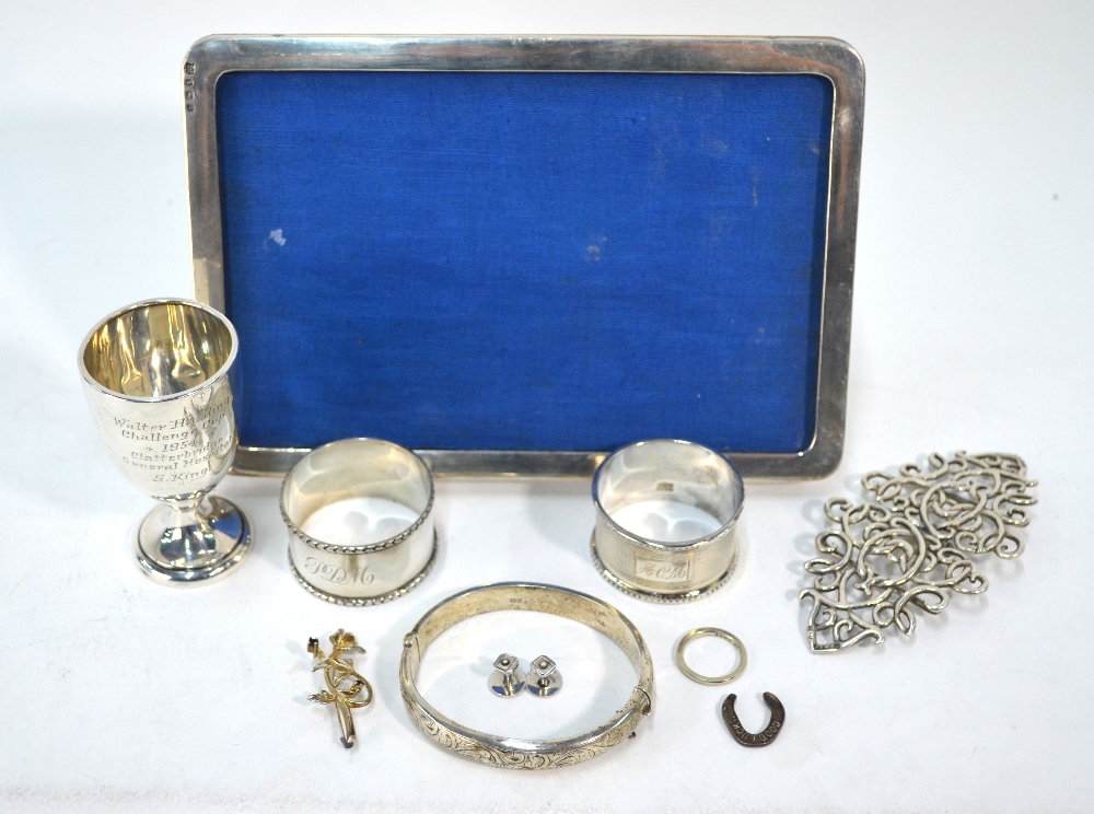 Various oddments of silver, including two napkin rings, a small trophy cup, photograph frame, - Image 8 of 8