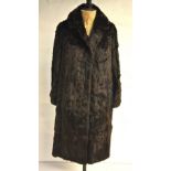 A Hickley's shadowed musquash fur coat and a dark brown French squirrel fur coat,