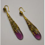 A pair of purple paste and gilt metal filigree style long drop earrings for pierced ears
