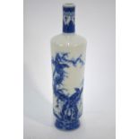 A Chinese blue and white vase with cylindrical neck and tapering body,