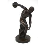 An antique brown bronze cast figure of a classical discus thrower, on circular base,