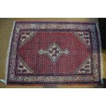 A Persian Seraphan rug,