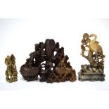 Three pieces of Chinese soapstone, comprising: a standing figure of a Fisherman,