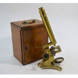 A 19th century brass microscope in fitted mahogany case,