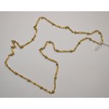 A yellow metal chain, part box link and part fancy link, stamped 375, approx 7.