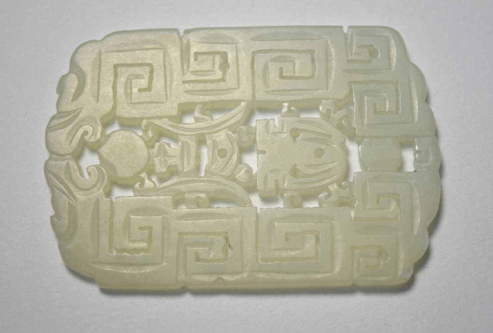 A Chinese green jade pendant of whitish hue, - Image 2 of 7