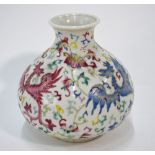 A Chinese famille rose vase decorated in variously coloured enamels with mythological birds in