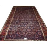 An antique Persian Baluch 'Mina Khani' design rug, circa 1900,
