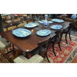 A Victorian mahogany draw leaf dining table with three insert leaves,