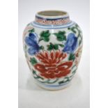 A small wucai oviform vase, decorated in underglaze blue, yellow, green,