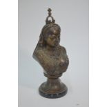 A brown patinated bronze bust of Queen Victoria, raised on a on marble base,
