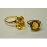 A contemporary single stone ring set with faceted citrine in handmade high claw setting to/w oval