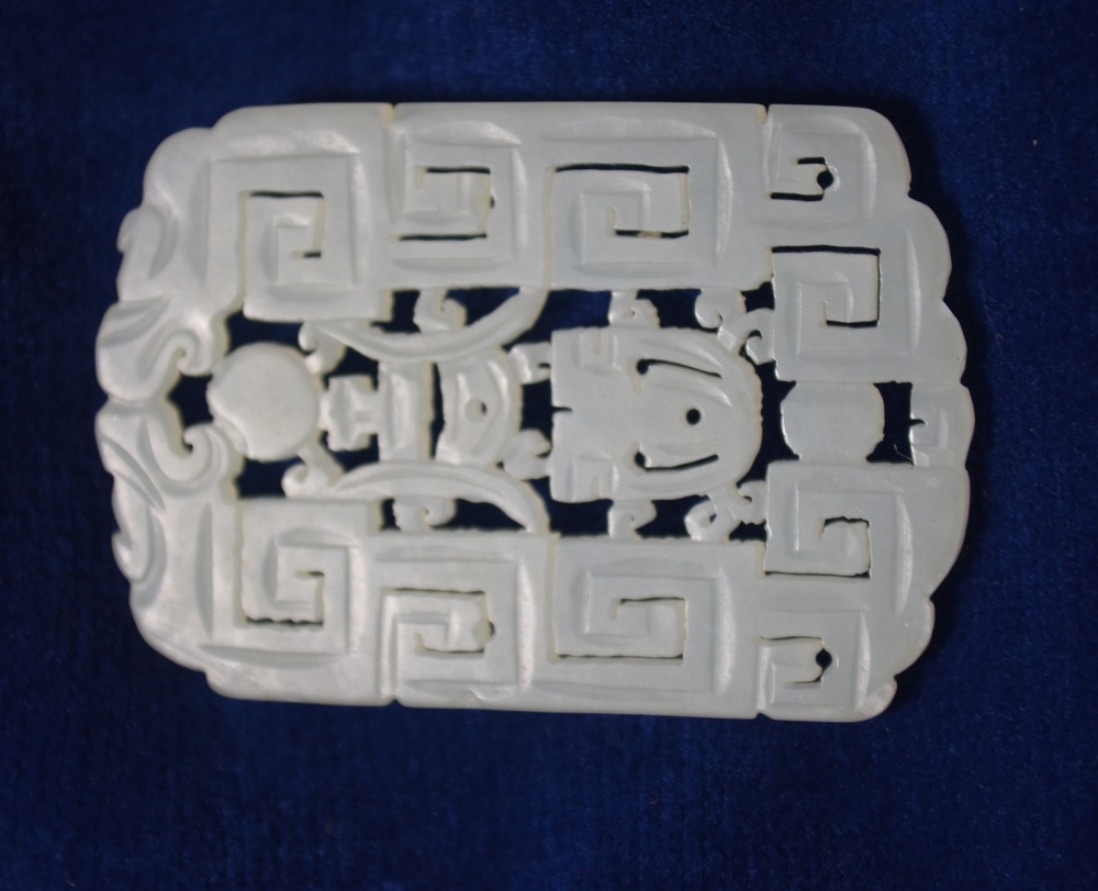 A Chinese green jade pendant of whitish hue, - Image 3 of 7
