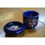 Two Moorcroft bowls, both blue ground and decorated with the clematis pattern, impressed Moorcroft,