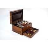 A Victorian rosewood dressing case by Parkins & Gotto of Oxford Street London,