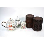 A Chinese Export teapot and cover decorated in famille rose with fish and aquatic foliage,
